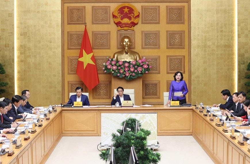 Thống đốc Ngân hàng Nhà nước Việt Nam Nguyễn Thị Hồng báo cáo tình hình hoạt động trong lĩnh vực ngân hàng. (Ảnh: Dương Giang/TTXVN).