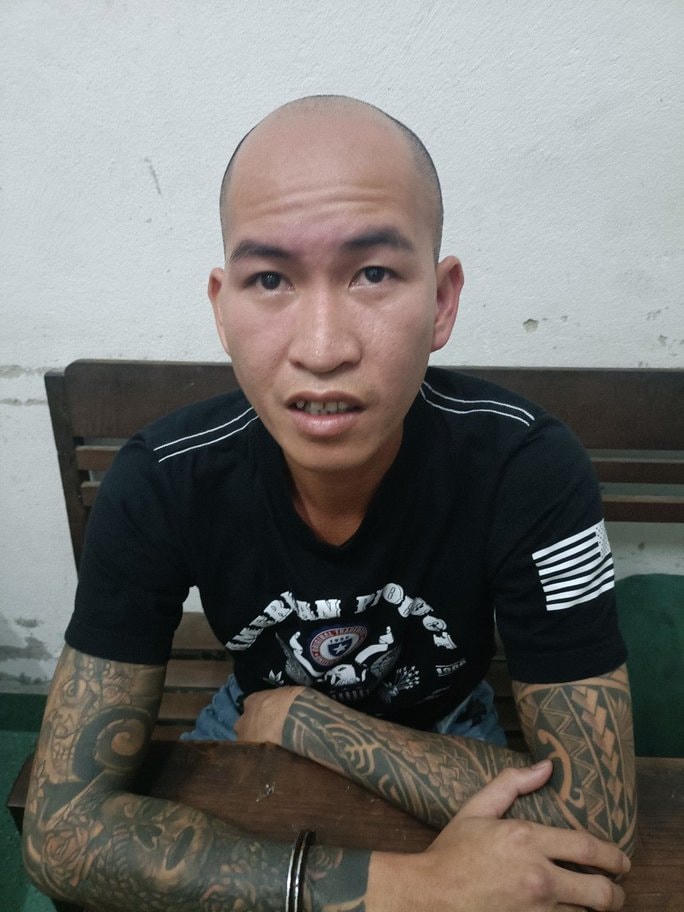 Trương Vạn Nhật tại trụ sở công an.