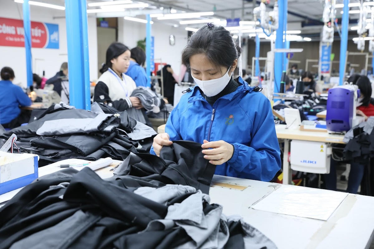 Đến thời điểm hiện tại, gần 100% người lao động đã quay trở lại làm việc tại các nhà máy, doanh nghiệp. Ảnh: Quang Vinh.