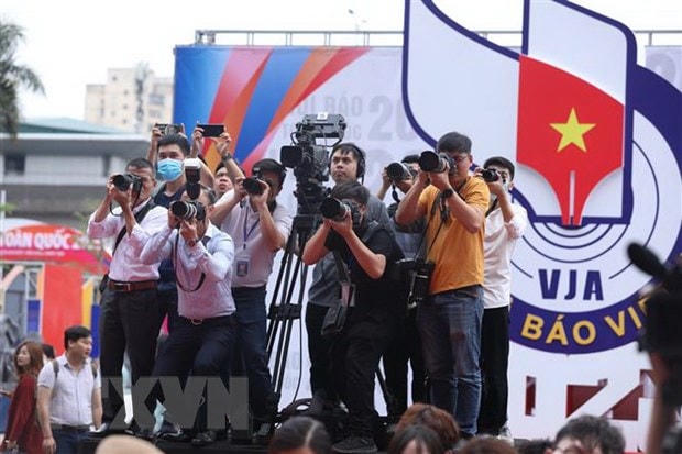 Phóng viên tác nghiệp tại Hội Báo toàn quốc 2023. Nguồn: TTXVN.