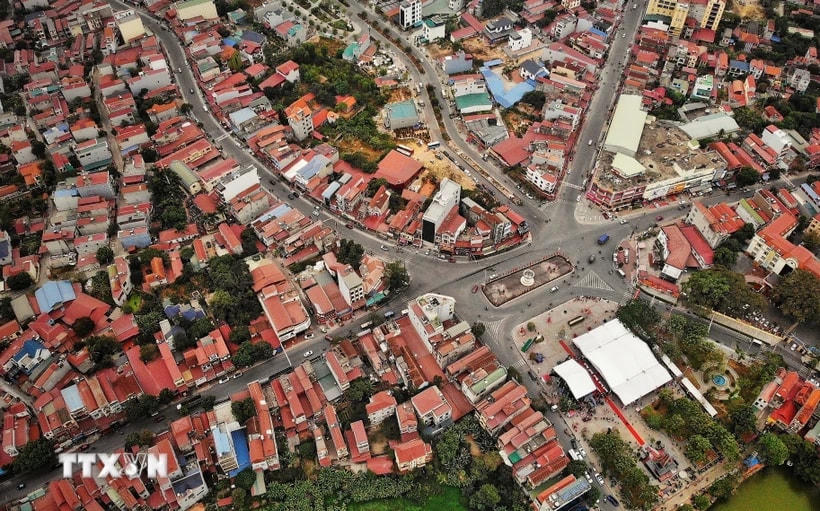 Trung tâm hành chính - chính trị của đơn vị hành chính mới có vị trí địa lý thuận lợi, hạ tầng kinh tế - xã hội đồng bộ, nhất là hệ thống giao thông phát triển. (Ảnh: TTXVN)