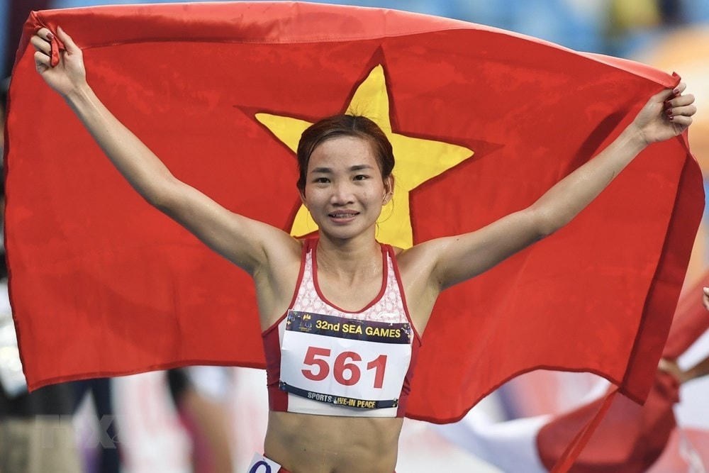 Nguyễn Thị Oanh giành HCV ở nội dung chạy 10.000m. (Ảnh: TTXVN).