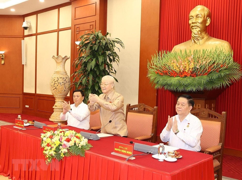 Tổng Bí thư Nguyễn Phú Trọng và các đồng chí lãnh đạo Đảng, Nhà nước tại buổi gặp mặt. Ảnh: Trí Dũng/TTXVN. 