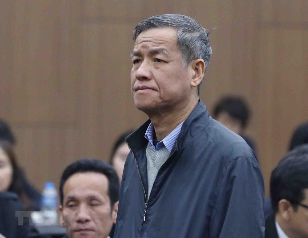 Bị cáo Đinh Quốc Thái, cựu Chủ tịch Ủy ban Nhân dân tỉnh Đồng Nai, nghe chủ tọa tuyên án. (Ảnh: Phạm Kiên/TTXVN).