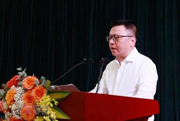 Chủ tịch Hội Nhà báo Việt Nam Lê Quốc Minh báo cáo kết quả và nhiệm vụ trong tâm của Hội Nhà báo. (Ảnh: Dương Giang/TTXVN).