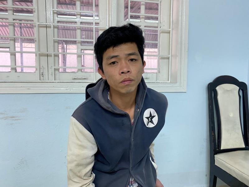 Lê Công Bình tại trụ sở công an. Ảnh: Công an Đà Nẵng.