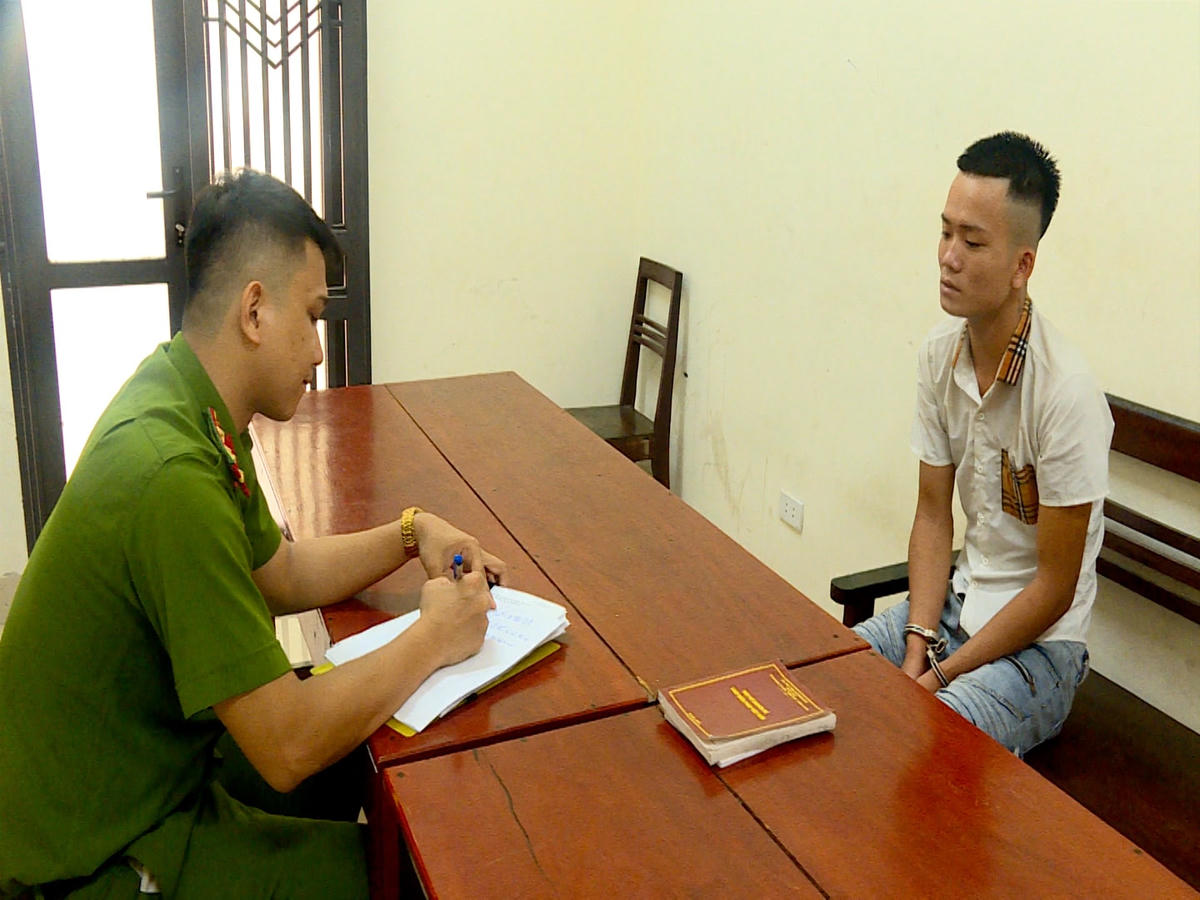 Đối tượng Nguyễn Văn Khải tại cơ quan điều tra. Ảnh: Cơ quan Công an.