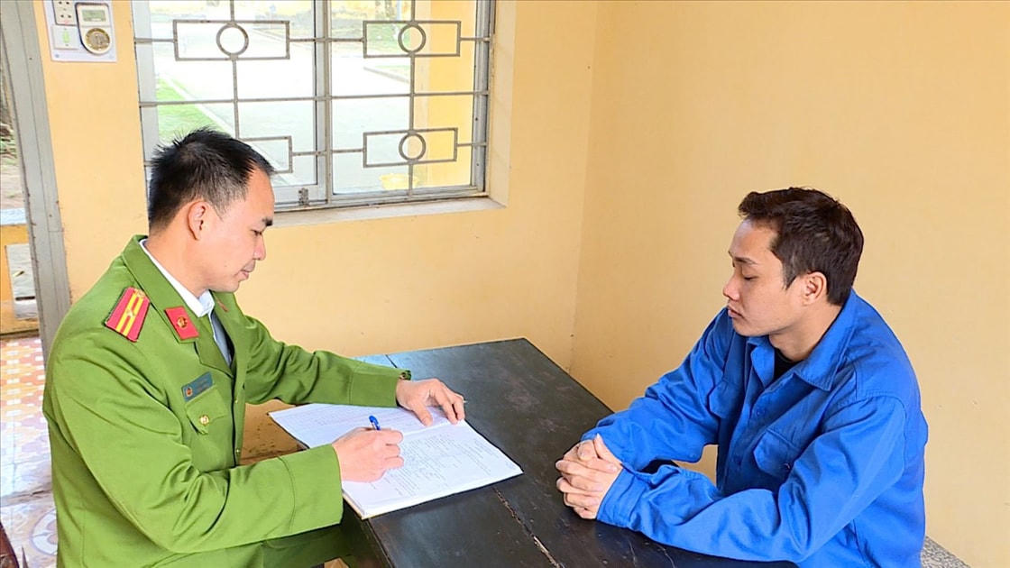 Đối tượng Đàm Quốc Hàm tại cơ quan Công an.  Ảnh: Bộ Công an.