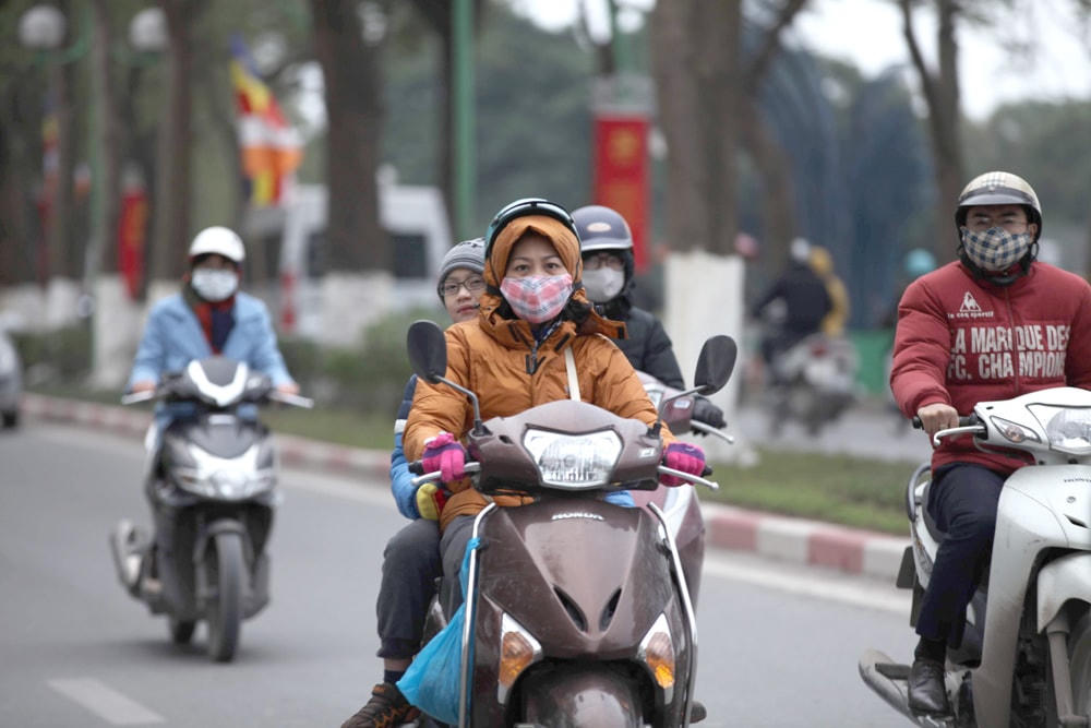 Thủ đô Hà Nội có mây, ngày nắng, đêm không mưa, trời rét. Ảnh: Lê Khánh.