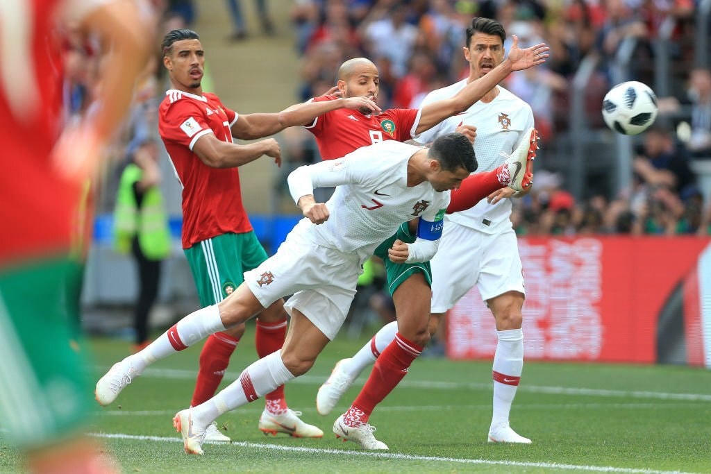 Pha đánh đầu của Ronaldo hạ gục tuyển Morocco 4 năm trước. Ảnh: Getty.