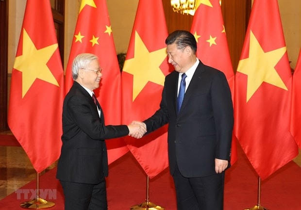 Tổng Bí thư, Chủ tịch nước Trung Quốc Tập Cận Bình đón Tổng Bí thư Nguyễn Phú Trọng trong chuyến thăm Trung Quốc hồi tháng 1/2017. (Ảnh: Trí Dũng/TTXVN).