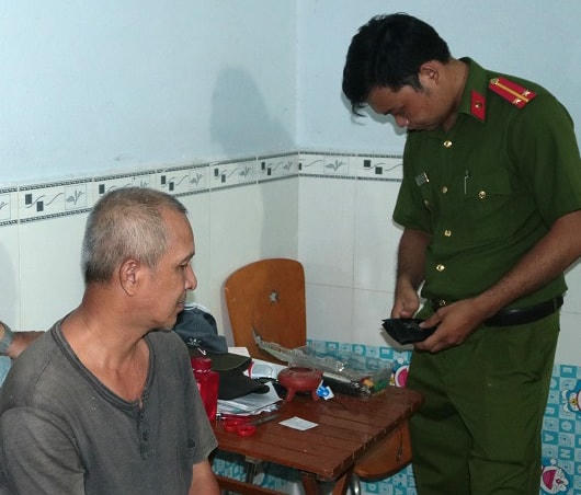 Trần Hữu Thắng tại cơ quan Công an. 