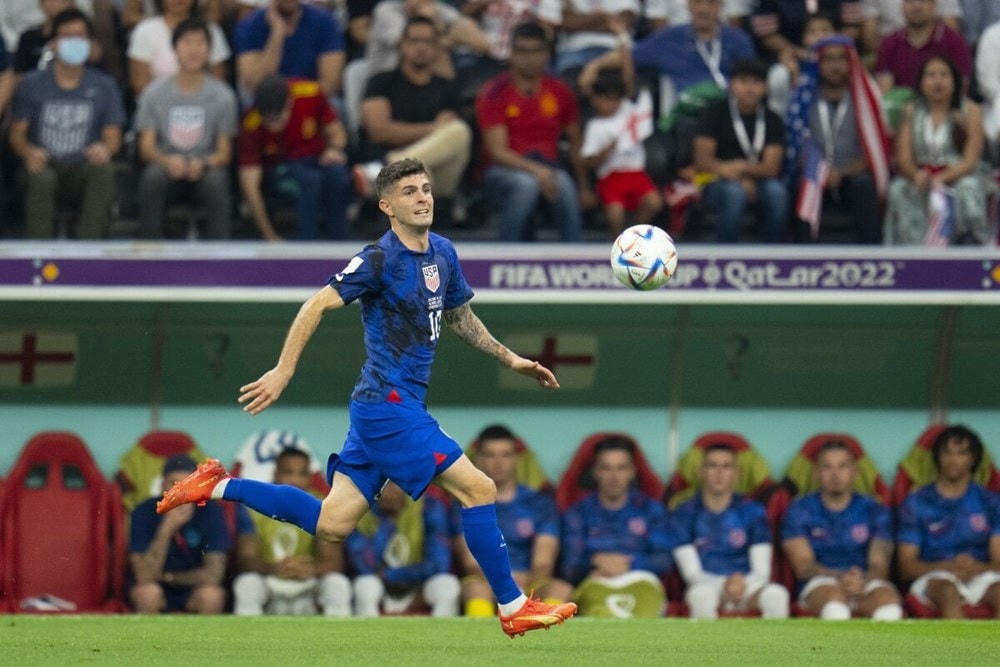 Tuyển Mỹ giành vé đi tiếp nhờ sự tỏa sáng của Christian Pulisic với bàn thắng quyết định vào lưới Iran ở lượt cuối bảng B. (Nguồn: Getty Images).