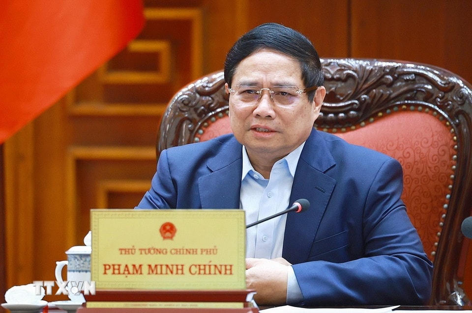 Thủ tướng Phạm Minh Chính chủ trì cuộc họp về mức áp thuế mới của Hoa Kỳ đối với hàng hoá nhập khẩu từ Việt Nam. (Ảnh: Dương Giang/TTXVN)