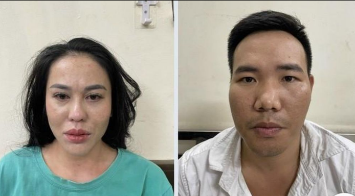 Hai đối tượng Vũ Kim Nhung và Nguyễn Khắc Hiền tại cơ quan công an.