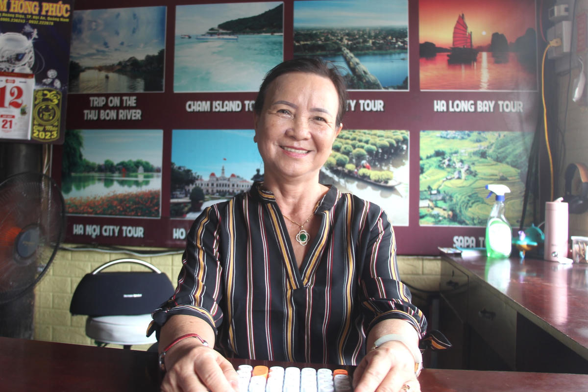 Bà Võ Thị Liên nói về việc bán vé tham quan phố cổ.