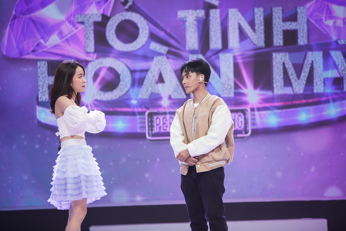 Trần Vân bất ngờ bấm nút tỏ tình ngược với Rum nhưng chỉ để động viên chàng ca sĩ đa tài. Ảnh: Perfect Universe.