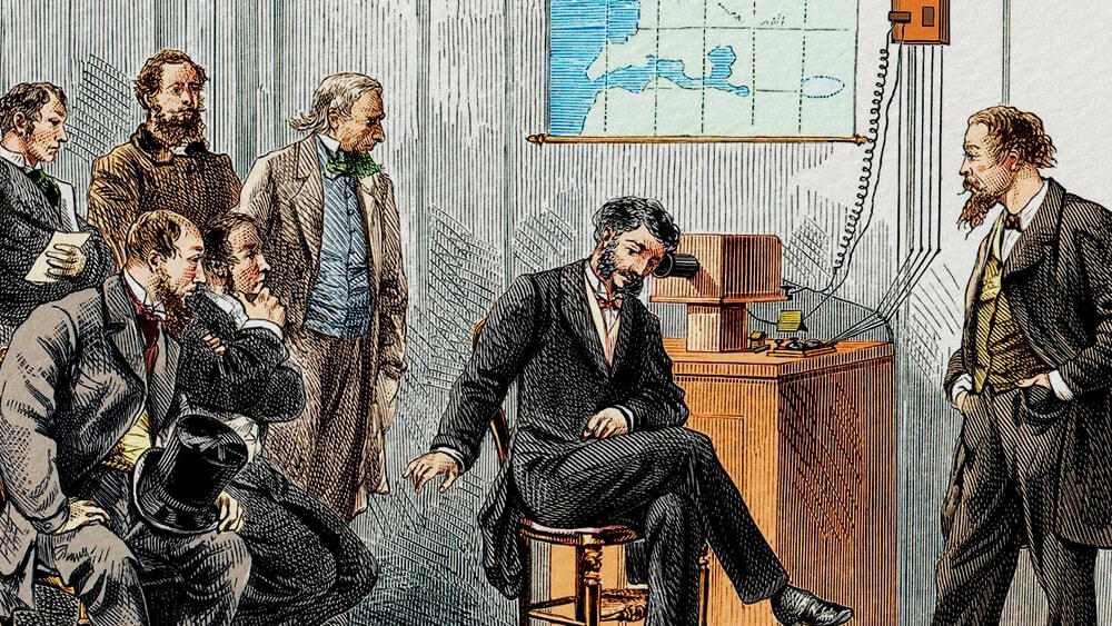 Nhà bác học Alexander Graham Bell trong buổi thử nghiệm chiếc điện thoại vào năm 1877.  
