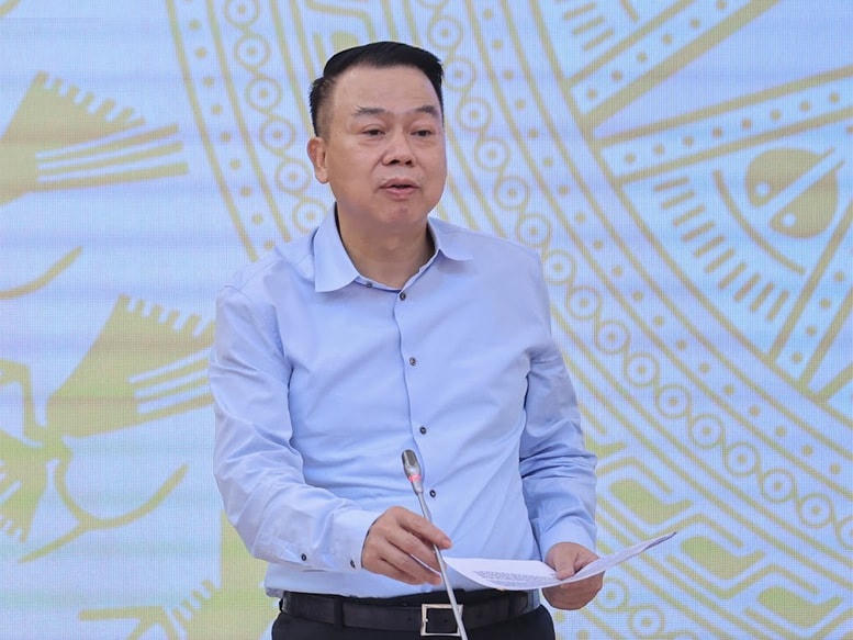 Thứ trưởng Bộ Tài chính Nguyễn Đức Chi trả lời câu hỏi của phóng viên về thí điểm giao dịch tài sản mã hóa. Ảnh: VGPNhật Bắc