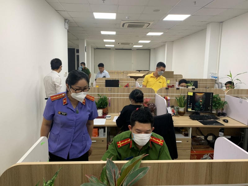 Cơ quan CSĐT Bộ Công an khám xét một trong những trụ sở của AIC. Ảnh: cand.com.vn.