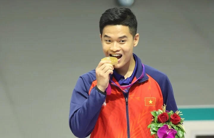 Phạm Quang Huy đã đem về HCV nội dung 10m súng ngắn hơi nam ở ASIAD 19 cho đoàn TTVN. Ảnh: Tam Ninh.