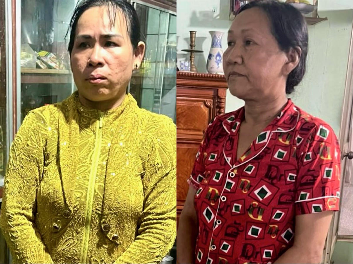 Trương Thị Tâm (áo vàng) và Nguyễn Thị Lý (áo đỏ) tại thời điểm bị Công an bắt quả tang .(Ảnh: Trọng Nguyễn)