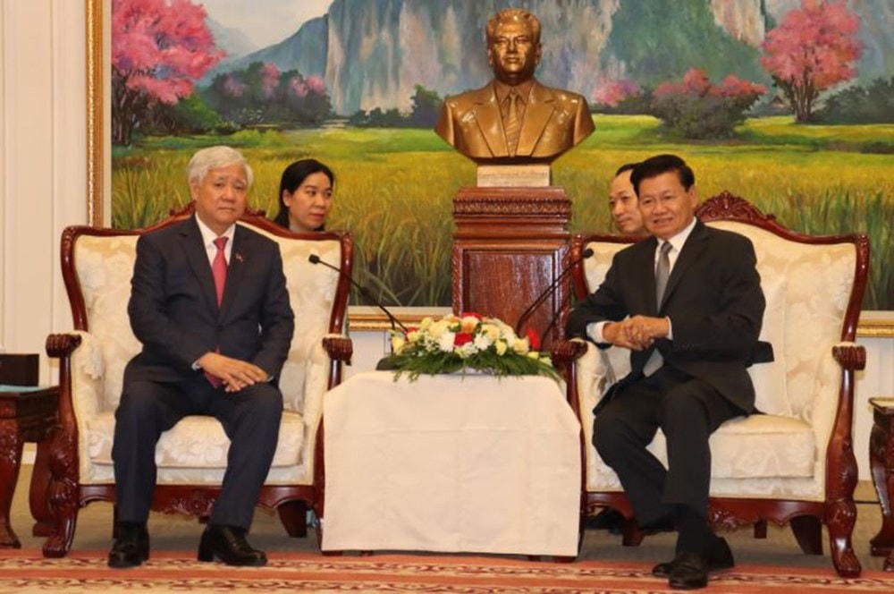 Chủ tịch Đỗ Văn Chiến trao đổi cùng với Tổng Bí thư, Chủ tịch nước CHDCND Lào Thongloun Sisoulith.