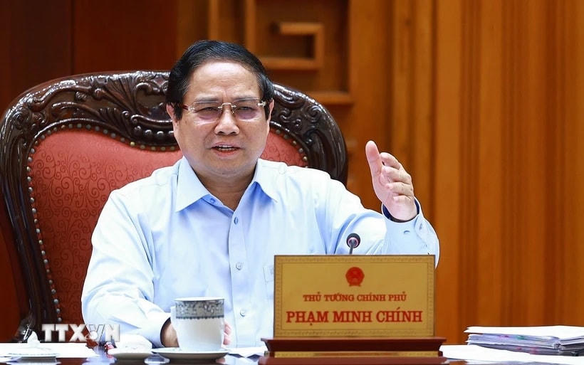 Thủ tướng Phạm Minh Chính chủ trì họp Thường trực Chính phủ với các bộ, ngành và Đoàn đàm phán Chính phủ về các vấn đề thương mại với Hoa Kỳ. (Ảnh: Dương Giang/TTXVN)