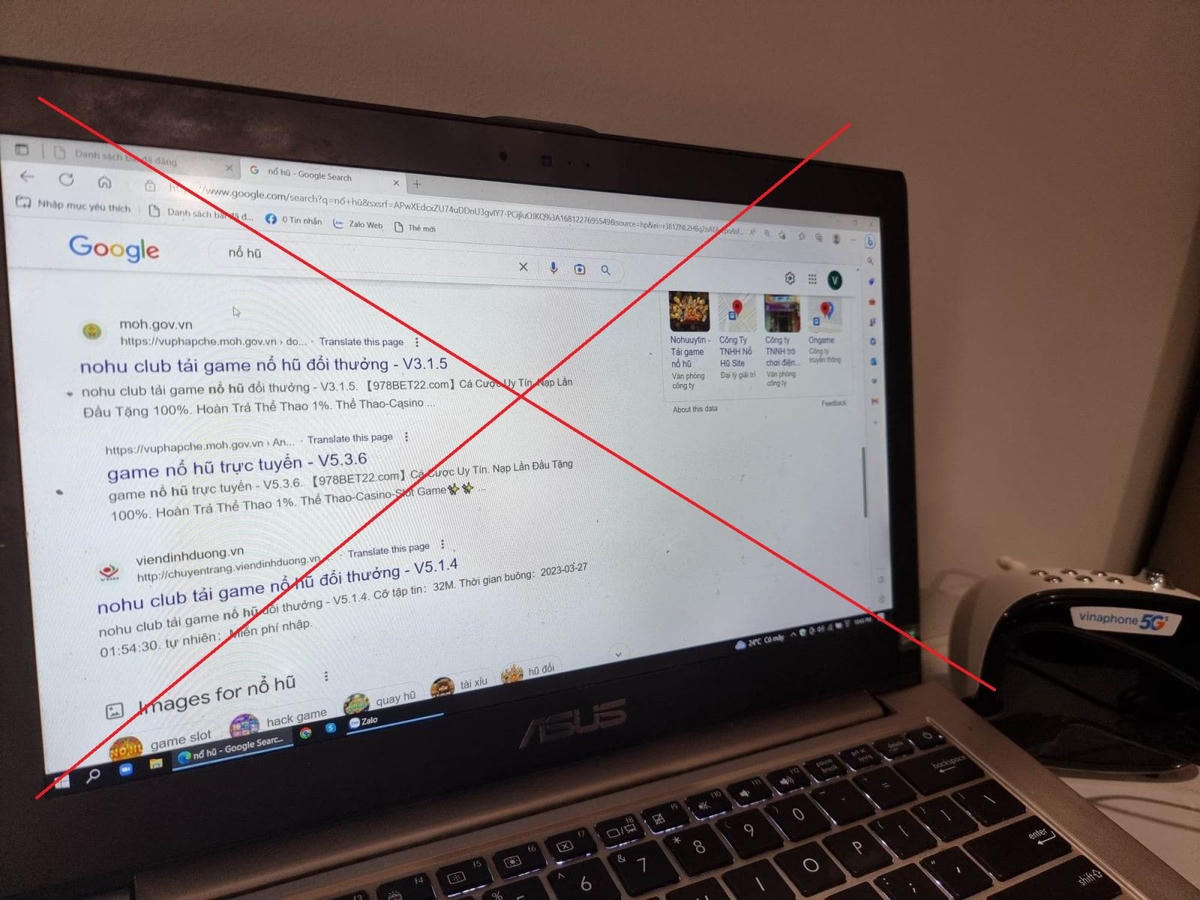 Một trang web đuôi gov.vn bị gắn link quảng cáo. Ảnh: TTXVN.