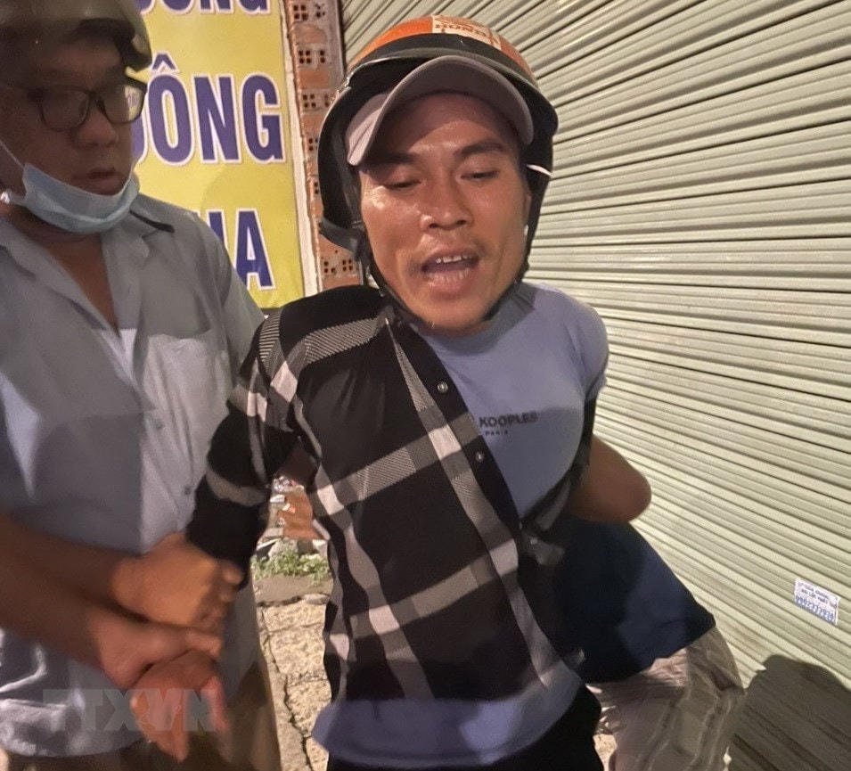 Đoàn Minh Hải - nghi can giết 3 người thân trong một gia đình bị bắt giữ tại thành phố Hồ Chí Minh. (Ảnh: TTXVN phát).