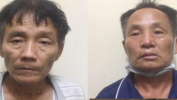 Ông Nguyễn Hữu Trung và ông Nguyễn Văn Quảng tại cơ quan điều tra.