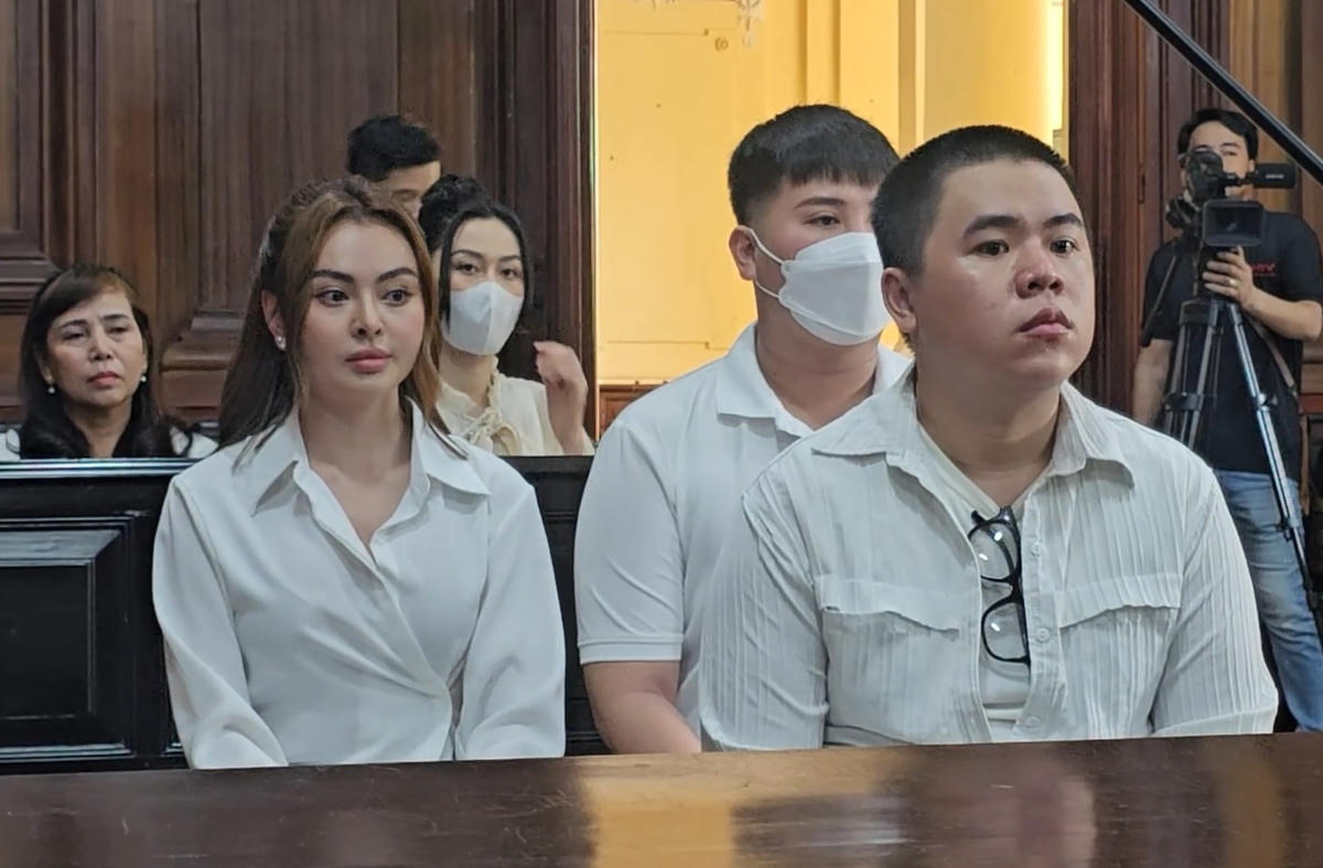 Bị cáo Nguyễn Xuân Hương Trang (thường gọi là Trang "Nemo") và các đồng phạm tại tòa. (Ảnh: T.Bình).