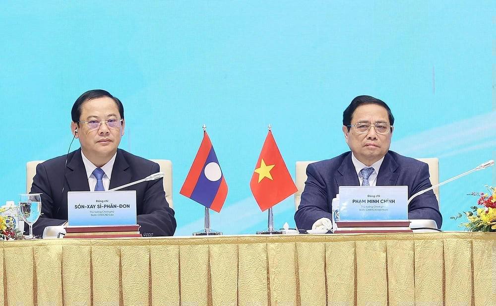 ttxvn-thu-tuong-pham-minh-chinh-va-thu-tuong-lao-sonexay-siphandone-du-hoi-nghi-hop-tac-dau-tu-viet-nam-lao-12-4047.jpg