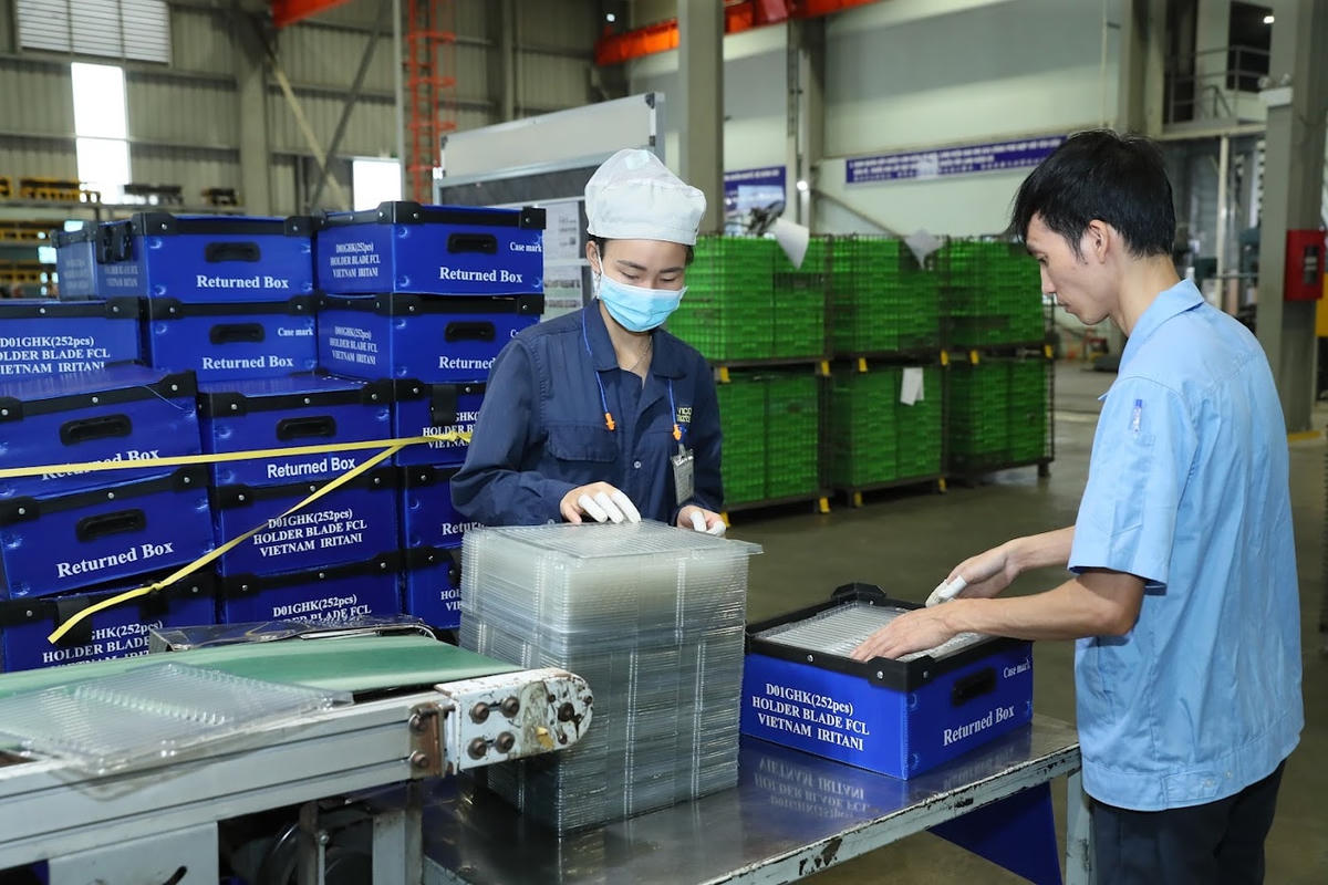 Thời gian qua, cộng đồng doanh nghiệp đã nỗ lực vượt khó. Ảnh: Quang Vinh.