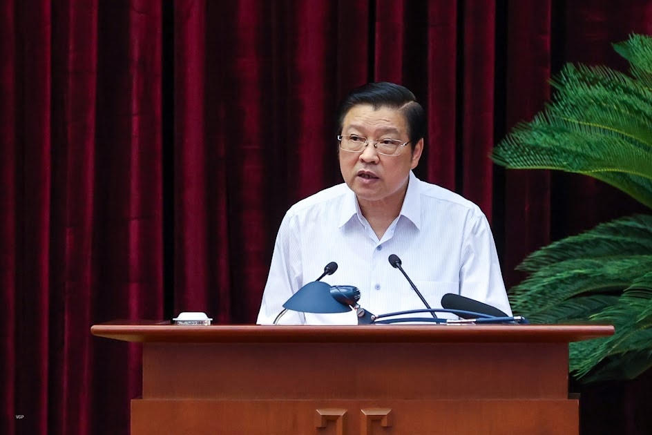 Ông Phan Đình Trạc, Trưởng ban Nội chính Trung ương - cơ quan Thường trực của Ban Chỉ đạo Trung ương về phòng chống tham nhũng, tiêu cực báo cáo tại hội nghị.