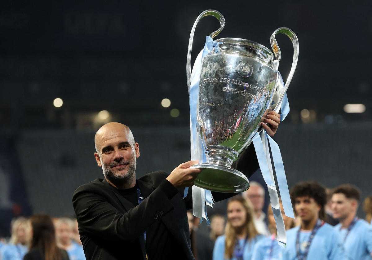 HLV Pep Guardiola đi vào lịch sử. Ảnh: Reuters.