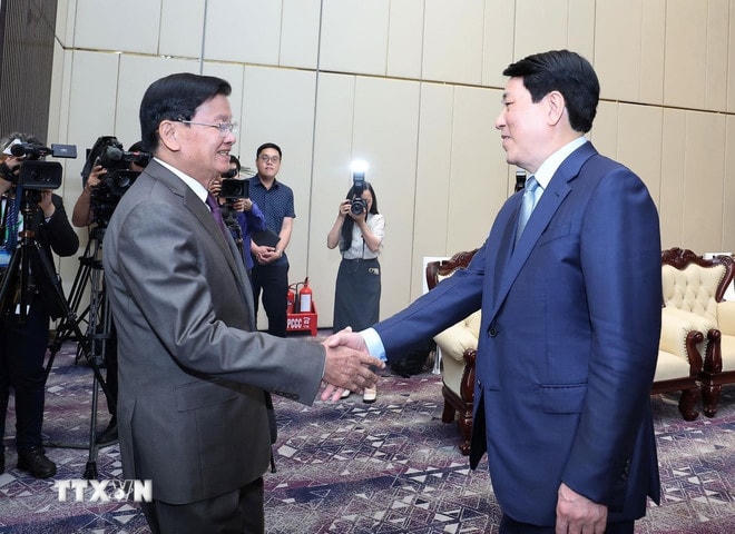 ttxvn-chu-tich-nuoc-luong-cuong-hoi-kien-tong-bi-thu-chu-tich-nuoc-lao-thongloun-sisoulith-2.jpg
