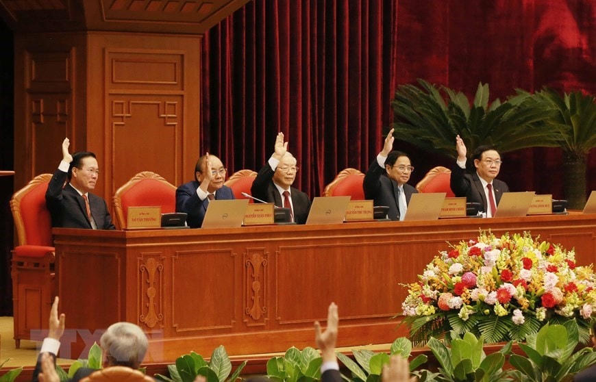 Các đại biểu biểu quyết thông qua chương trình hội nghị. (Ảnh: Phương Hoa/TTXVN).
