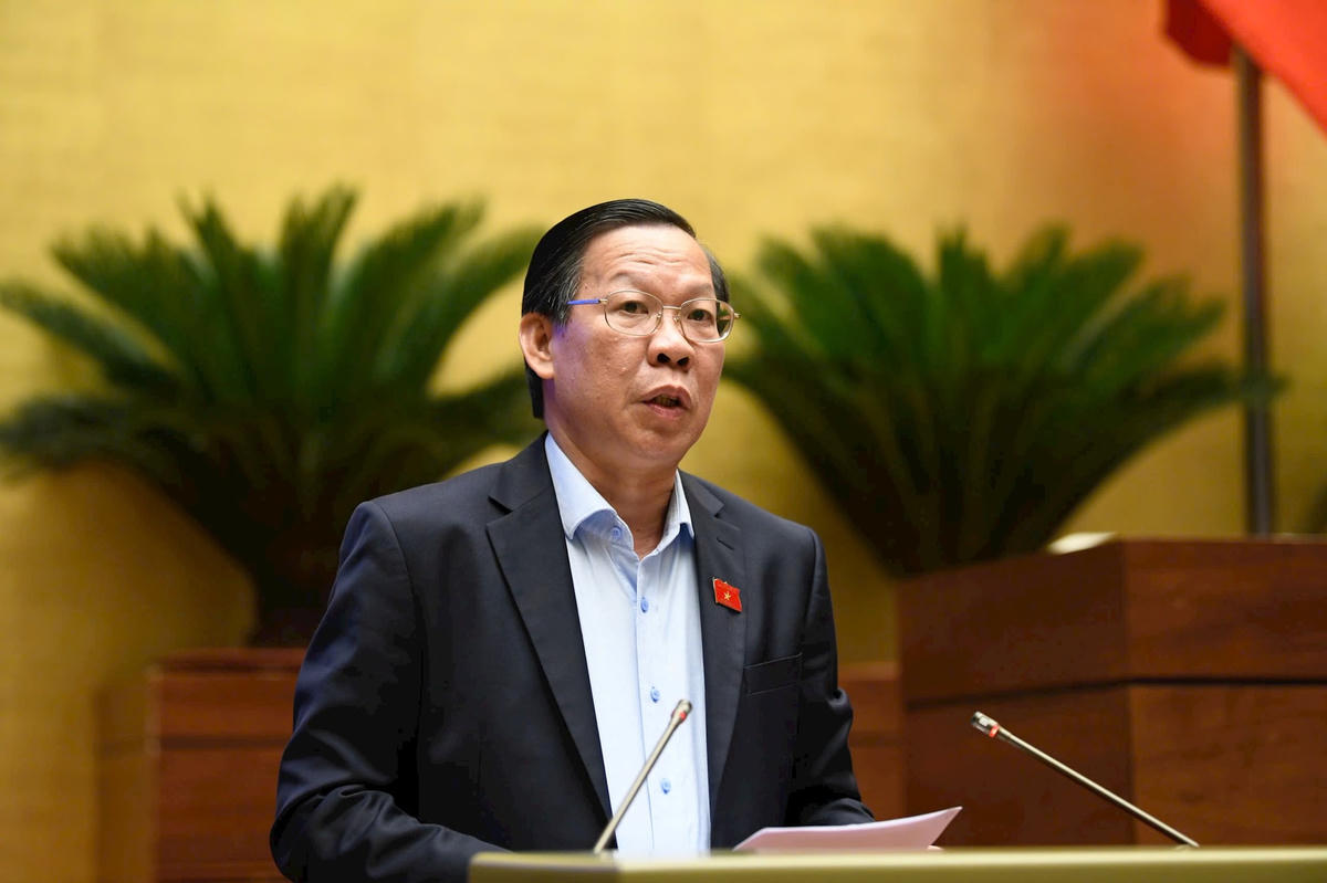 Ông Phan Văn Mãi, Chủ nhiệm Uỷ ban Kinh tế - Tài chính của Quốc hội báo cáo giải trình trước Quốc hội (Ảnh: Minh Nam)