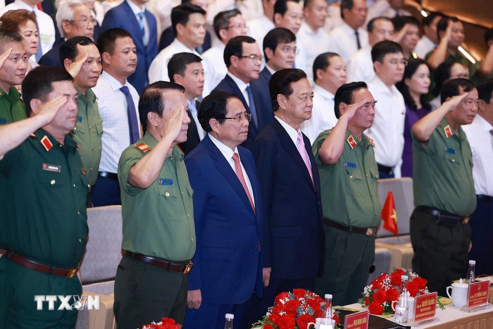 Thủ tướng Phạm Minh Chính và các đại biểu dự Đại hội Thi đua “Vì an ninh Tổ quốc” lần thứ 9. (Ảnh: Dương Giang/TTXVN)