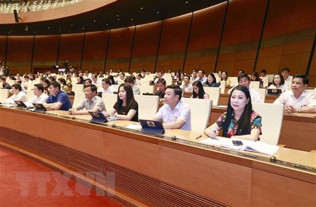 Trong phiên làm việc sáng, Quốc hội thảo luận ở hội trường về dự án Luật Nhà ở (sửa đổi). (Ảnh: Doãn Tấn/TTXVN).