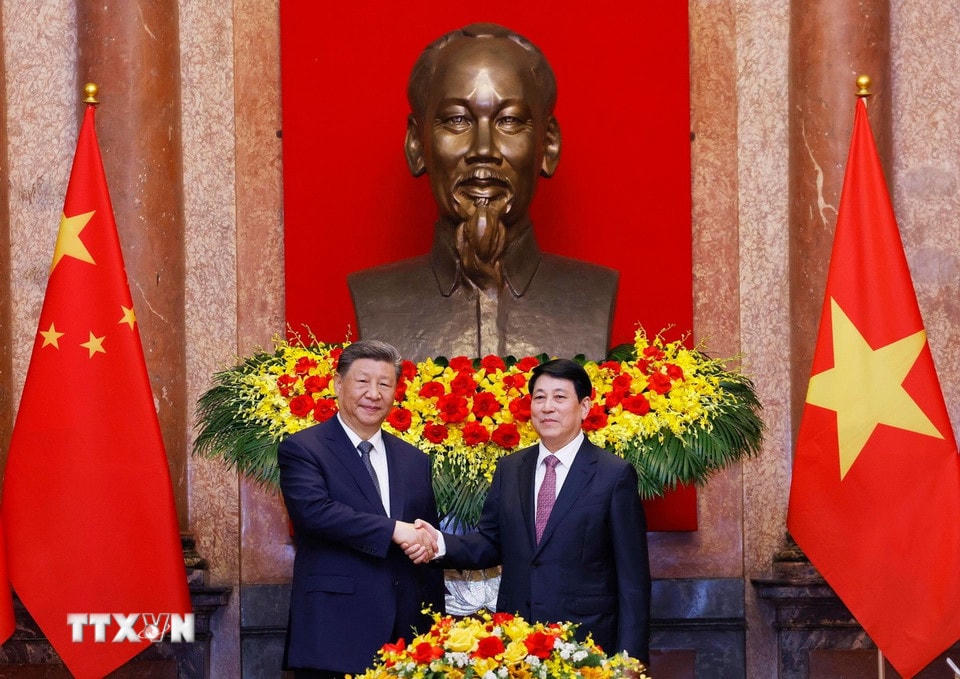 Chủ tịch nước Lương Cường với Tổng Bí thư, Chủ tịch nước Trung Quốc Tập Cận Bình. (Ảnh: Phạm Kiên/TTXVN)