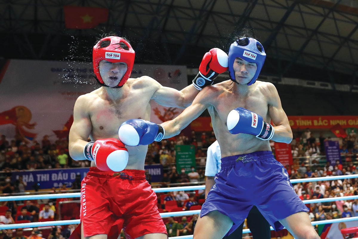 Trận chung kết tranh huy chương Vàng của vận động viên Kickboxing Nguyễn Quang Huy (giáp đỏ).