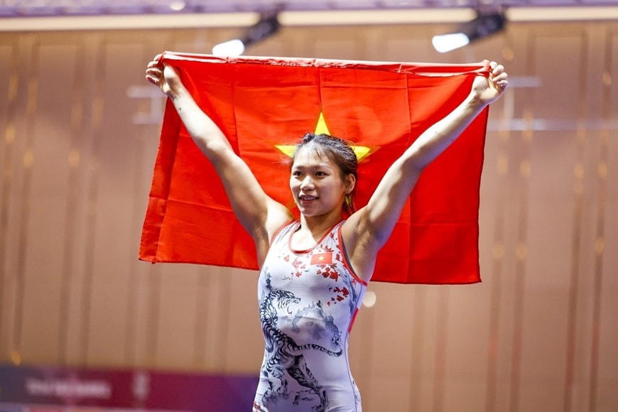 VĐV Trần Ánh Tuyết giành HCV ở hạng cân 59kg Nữ. Ảnh: Minh Quyết/TTXVN. 