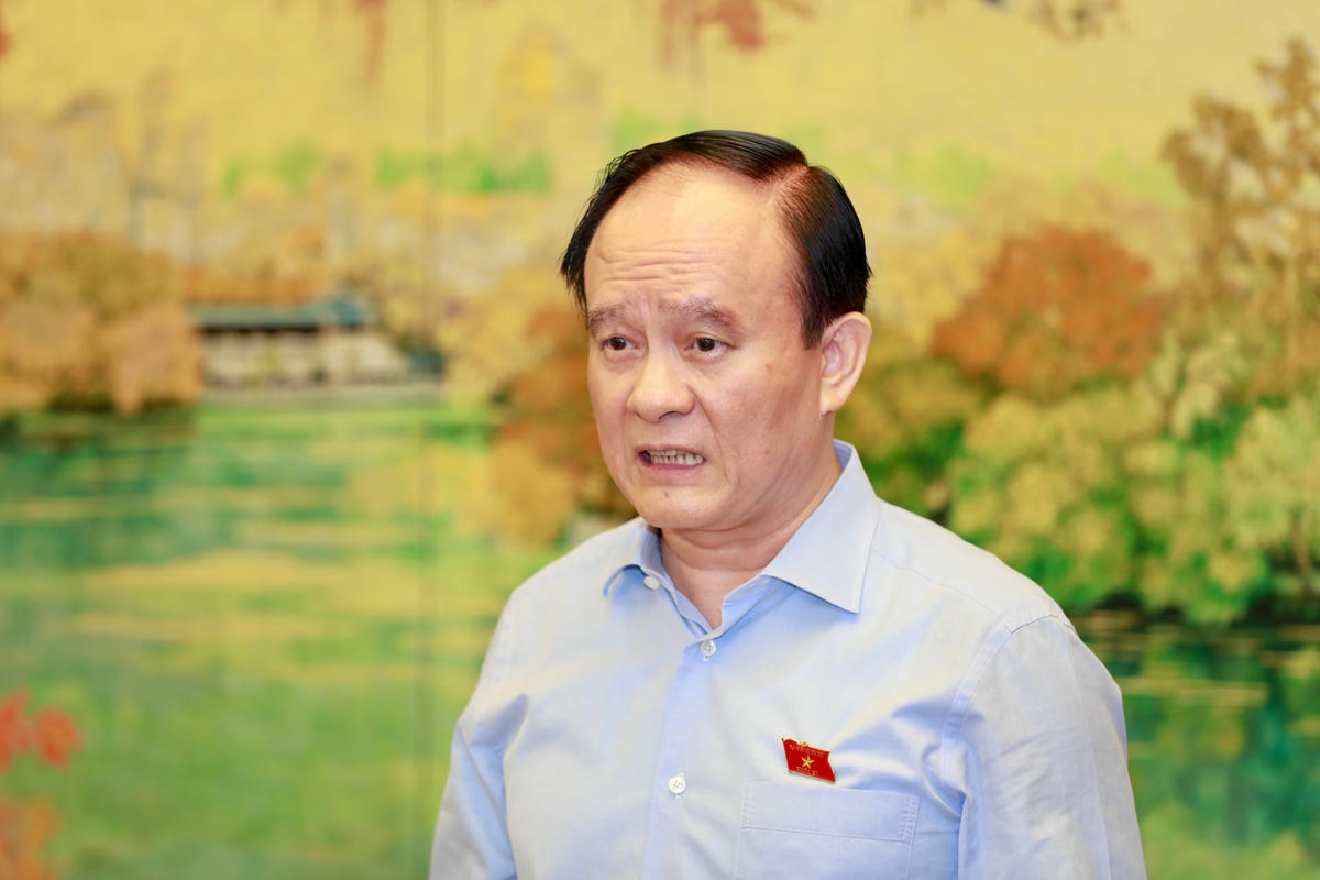 Chủ tịch HĐND TP Hà Nội Nguyễn Ngọc Tuấn phát biểu tại phiên thảo luận. Ảnh: Quang Vinh.