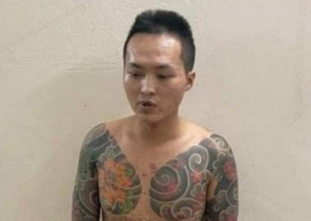 Đối tượng Trần Văn Cao tại cơ quan Công an.