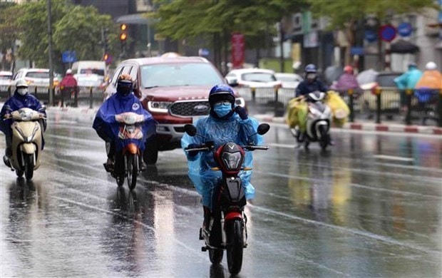 Thời tiết nồm ẩm ở Bắc Bộ sẽ kéo dài đến tháng 4. Ảnh: TTXVN.
