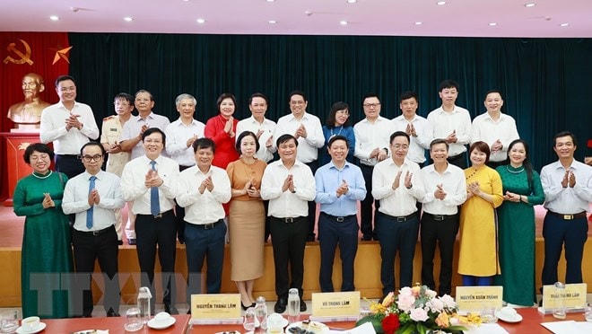 Thủ tướng Phạm Minh Chính với các đại biểu. (Ảnh: Dương Giang/TTXVN).