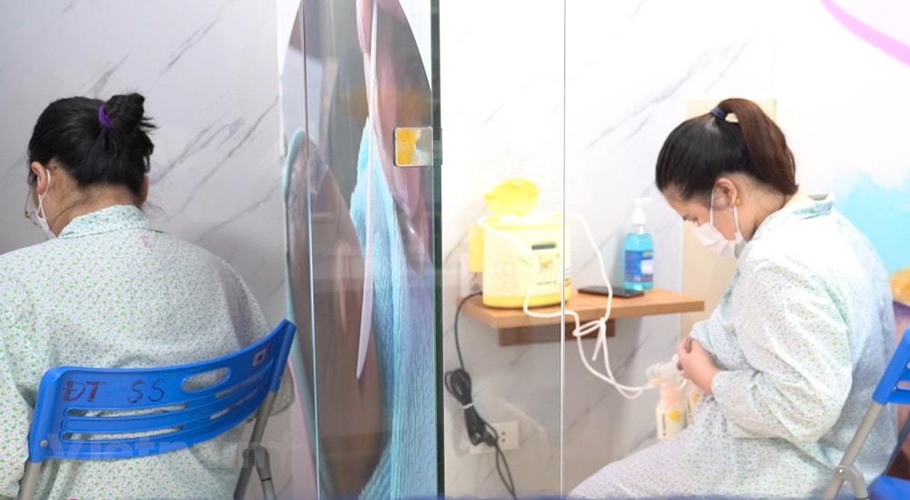 Cần mở rộng chính sách thai sản và tạo môi trường làm việc thân thiện hơn với lao động nữ. (Ảnh: PV/Vietnam+).