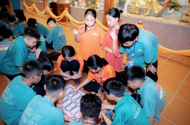 Chơi ô ăn quan.